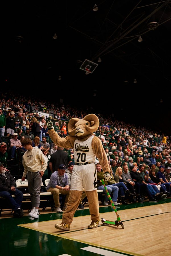 Colorado State University Mascot, CAM the Ram rides a green and gold scooter during a timeout at the men's home basketball game against University of Northern Colorado Dec. 3. Rams lost to the Bears by 5 points with a final score of 83-88.