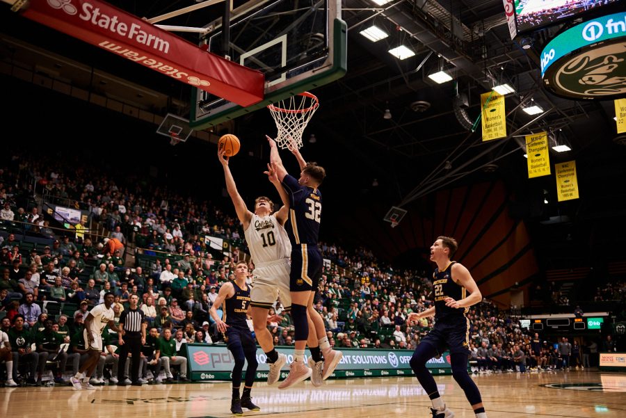 Forward James Moors (10) goes up for a layup and draws the foul at the home game against University of Northern Colorado Dec. 3. Moors scored 3 out of 4 possible points against the Bears from the freethrow line. Rams lost to the Bears by 5 points with a final score of 83-88.