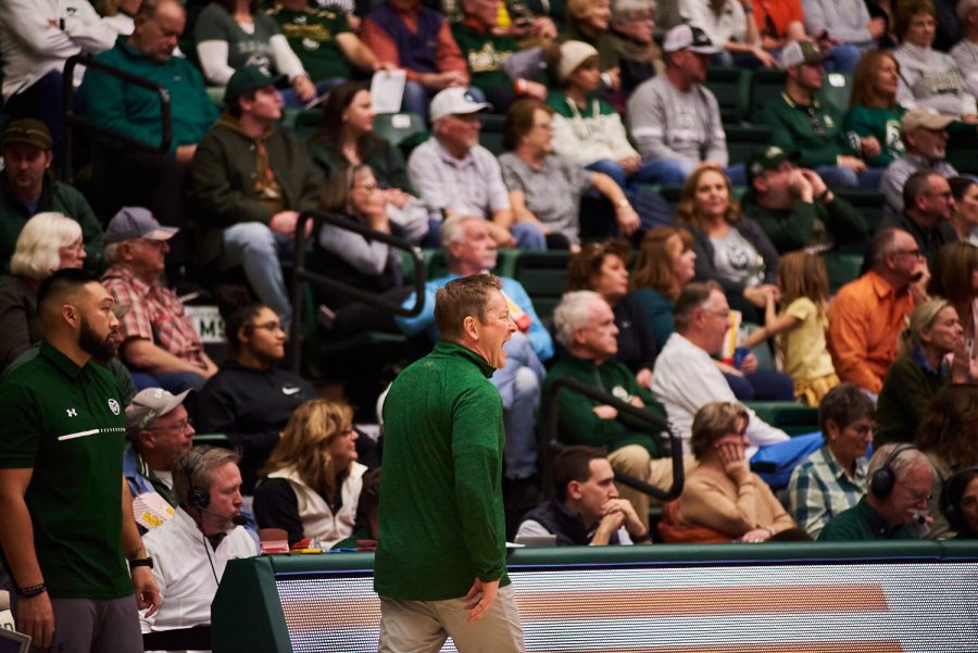 Head coach Niko Medved is disappointed by an unfair call by the referee and yells back to counter the call at the home game against University of Northern Colorado Dec. 3. Throughout the game, referees called a total of 24 fouls. Fans and coaches were outraged at the frequency of foul calls. Rams lost to the Bears by 5 points with a final score of 83-88.