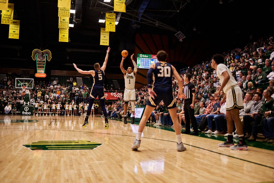Guard John Tonje (1) shoots a three pointer at the home game against University of Northern Colorado Dec. 3. Tonje scored 0 out of 3 attempted three pointers against the Bears. Rams lost to the Bears by 5 points with a final score of 83-88.