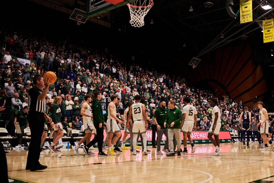 Colorado State University men’s basketball team and coaching staff gathers the team for a 60 second timeout at the home game against University of Northern Colorado Dec. 3. With 25 seconds left and a one point difference, the Rams took one last shot but missed. Rams lost to the Bears by 5 points with a final score of 83-88.