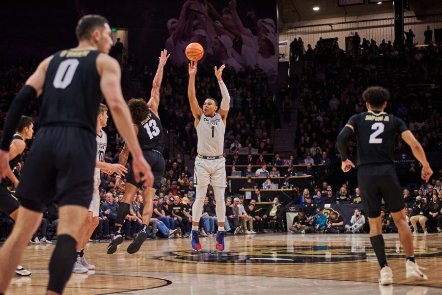 Guard John Tonje (1) shoots a 3-pointer at the University of Colorado Boulder basketball game Dec. 8, 2022. Tonje scored one out of four attempted 3-pointers against the Buffaloes. The Rams lost with a final score of 65-93.
