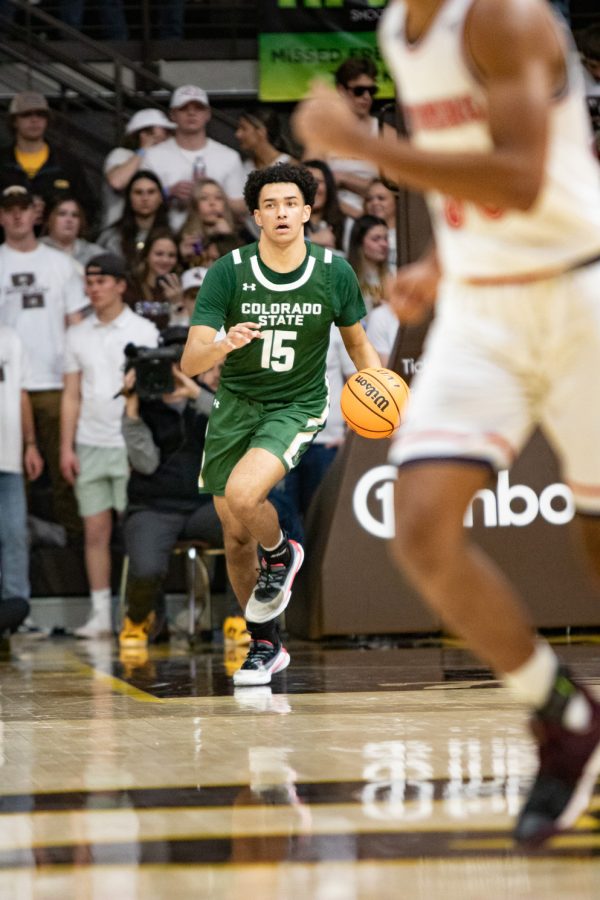 Colorado State guard Jalen Lake dribbles the ball up court of the inbound against Wyoming Nov 21.