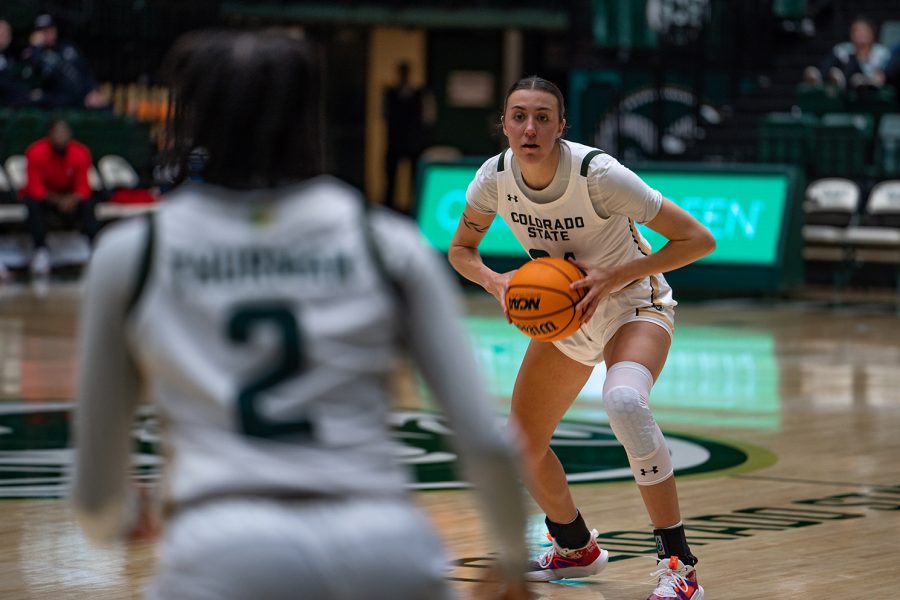 Colorado State University  guard Sydney Mech (24) passes the ball to Destiny Thurman (2) at the game against San Diego State University at Moby Arena Jan. 16, 2023. The Rams won 71-58.