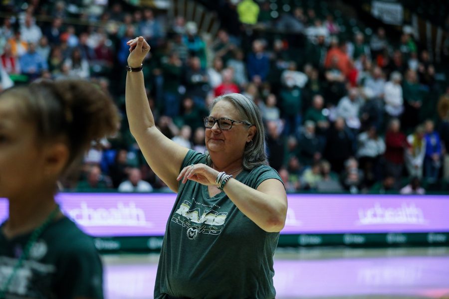 Marilyn Votaw waves to Kappa Kappa Gamma sorority members at the Colorado State University women's basketball game Jan. 21, 2023. Votaw, the Kappa Kappa Gamma house director, was among those honored at the fourth annual Fight Like a Ram game, which aims to support area cancer patients.