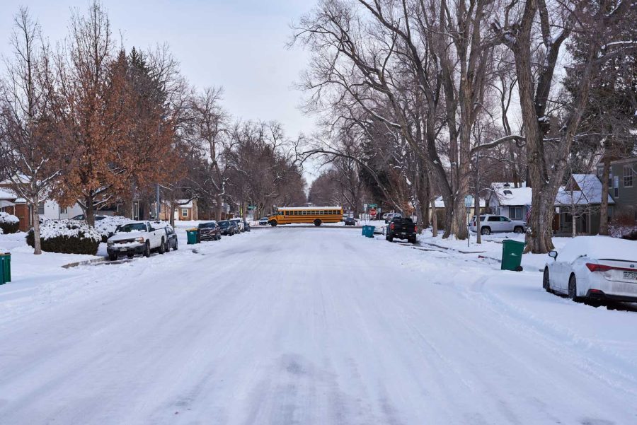 West Myrtle Street and South Grant Avenue, along with many other residential streets, remain unplowed days after the last snowfall while larger streets such as West Mulberry Street are plowed and supporting traffic flow Jan. 20.