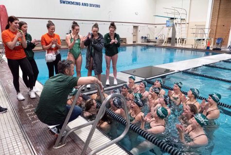 Colorado State University swimmer have a team meeting towards the end in the Butler Hancock Pool at the University of Northern Colorado invitational Jan. 27. Colorado State Rams won 185.5-113.5