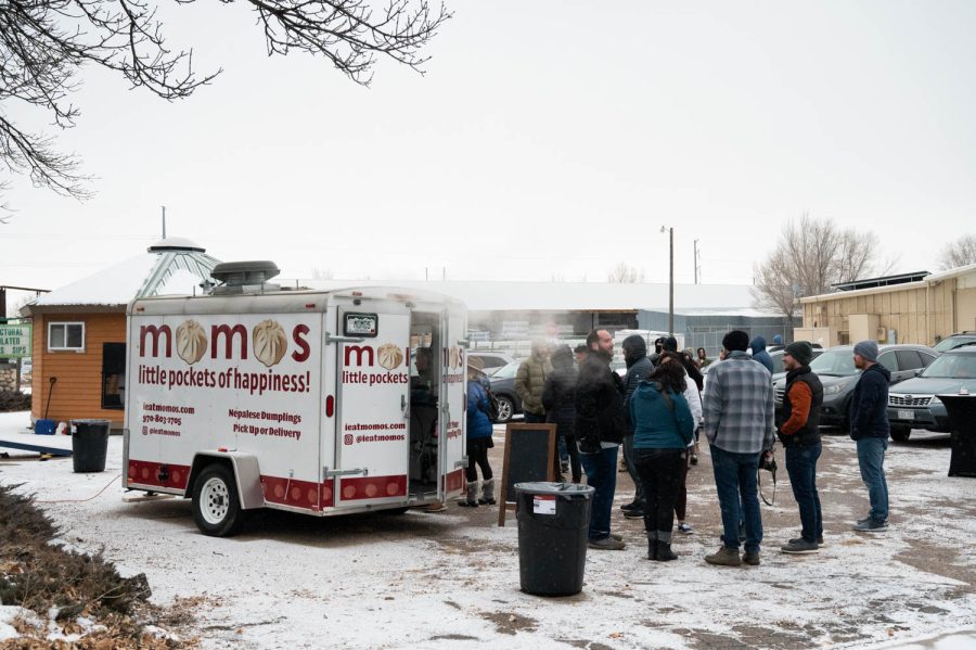 Customers+of+Momos+food+truck%2C+a+new+mobile+food+truck+that+serves+Nepalese+dumplings%2C+line+up+for+the+grand+opening+in+Fort+Collins+Jan.+28.+According+to+Momos+website%2C+the+food+truck+serves+authentic+Nepalese+momos+made+with+fresh+and+100%25+all-natural+ingredients.+