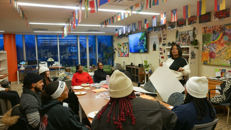 Colorado State Vice President of Inclusive Excellence Bridgette Johnson explains how to make a vision board in the Black/African American Cultural Center Feb. 15.