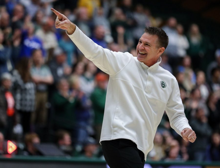 Colorado State University womens basketball head coach Ryun Williams celebrates with the crowd after the Rams 67-64 win over the United States Air Force Academy at Moby Arena Feb. 18, 2023.