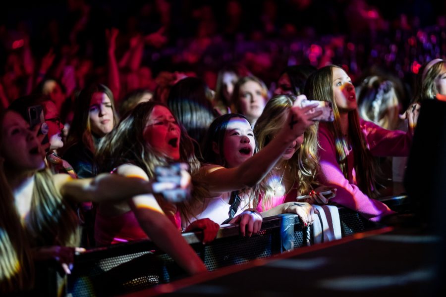 Taylor Fest goers dance and sing at the Aggie Theatre in Old Town Feb. 11. Taylor Fest is an event that travels across the country to bring Taylor Swift fans together, often selling out venues as they did at the Aggie.