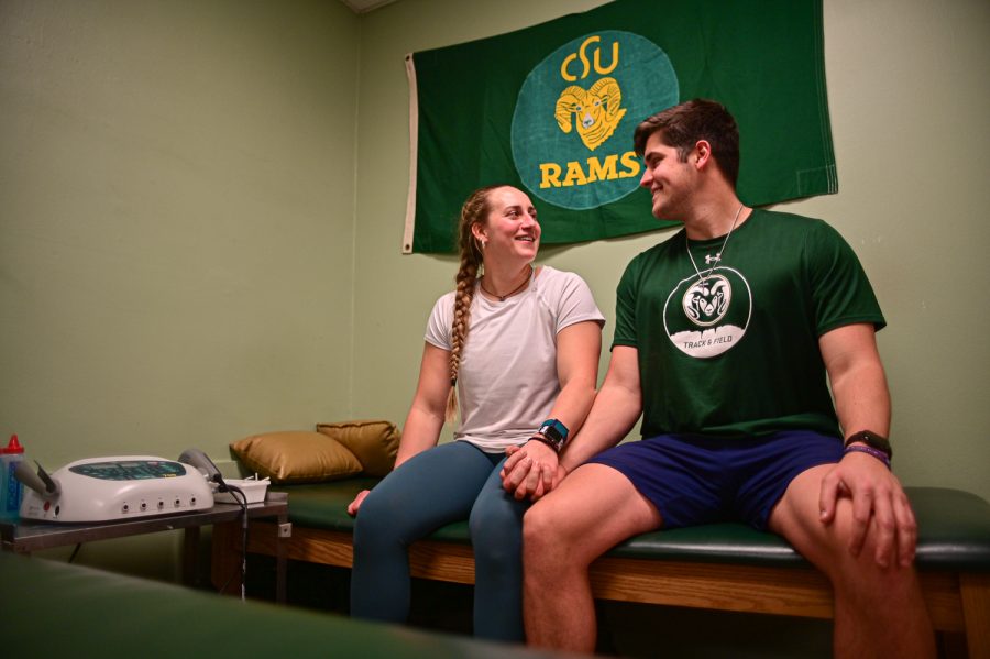 Jackson Morris and Gabi McDonald, Colorado State University track and field athletes, in the rehabilitation room at the Glen Morris Fieldhouse Feb. 14.
