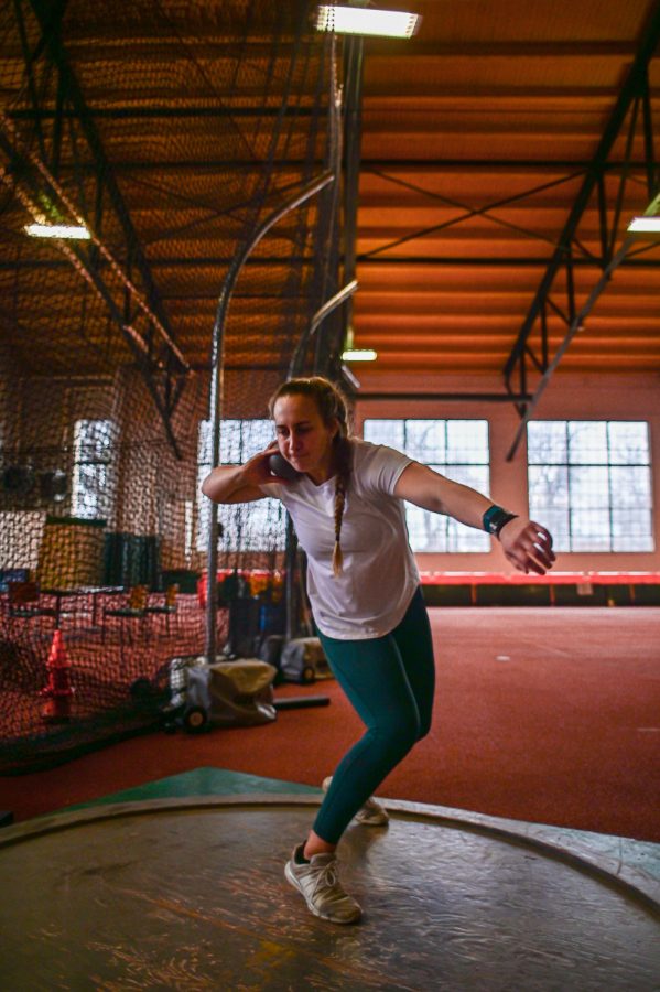 Gabi McDonald, Colorado State University track and field athlete, practice with the outdoor shot put at the Glen Morris Fieldhouse Feb. 14.