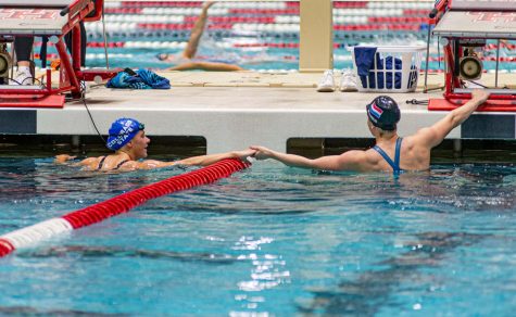 Lexie Trietley, Colorado State University swimmer, greet another athlete after her 50-yard freestyle during the 2023 Mountain West Swimming & Diving Championships in the Campus Recreation and Wellness Center Natatorium at the University of Houston Feb. 16.