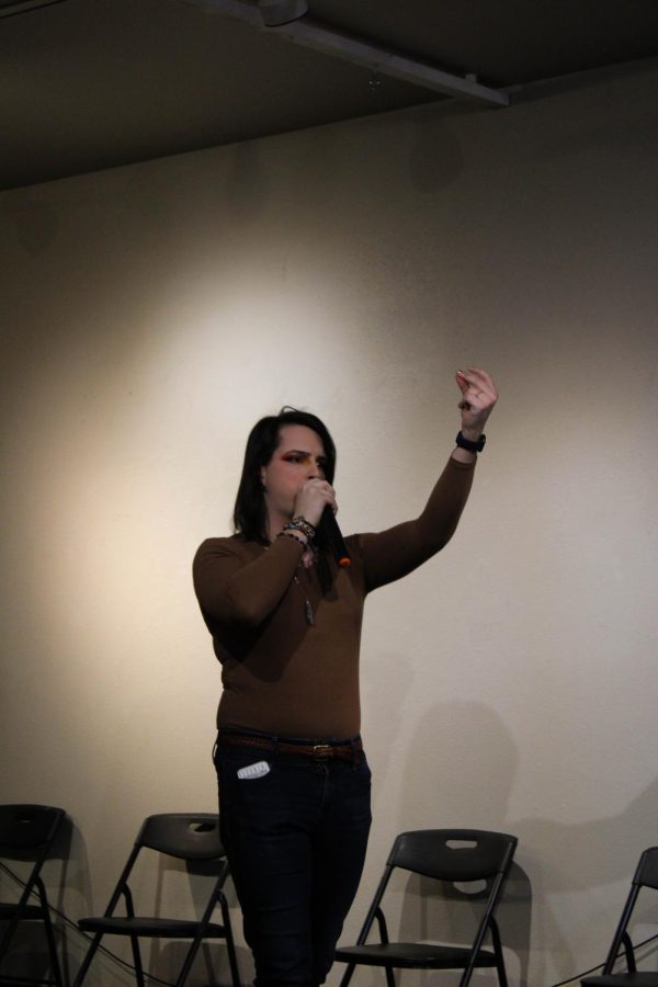 Aza Rose shows off their talents during a hypnosis show at the Art Lab in Fort Collins, Colorado Feb. 17. "I want to prove to people that hypnosis is real," Rose said. "I want to make the process of transitioning easier for people."
