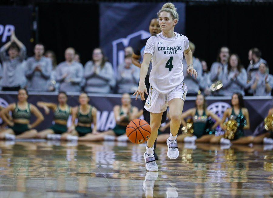 Colorado State University guard McKenna Hofschild (4) brings the ball up the court at the 2023 Mountain West Basketball Championships quarterfinals game against Boise State University in the Thomas & Mack Center in Las Vegas March 6. The Rams won 59-52.