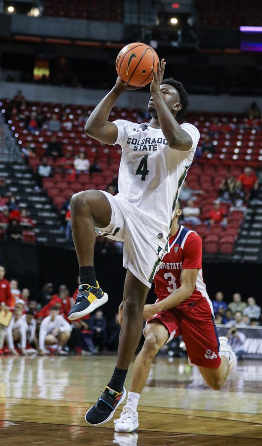 Colorado State University guard Isaiah Stevens (4) hits the game-winning shot against California State University, Fresno in the Thomas & Mack Center in Las Vegas March 8, 2023. The Rams beat the Bulldogs 67-65 to advance to the quarterfinals of the 2023 Mountain West Basketball Championships.