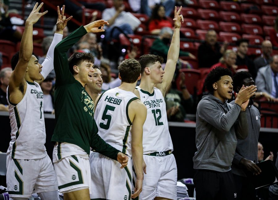 Players on the Colorado State University bench cheer after a 3-pointer from a teammate in the Thomas & Mack Center in Las Vegas March 8, 2023. The Rams beat California State University, Fresno 67-65 in the first round of the 2023 Mountain West Basketball Championships.