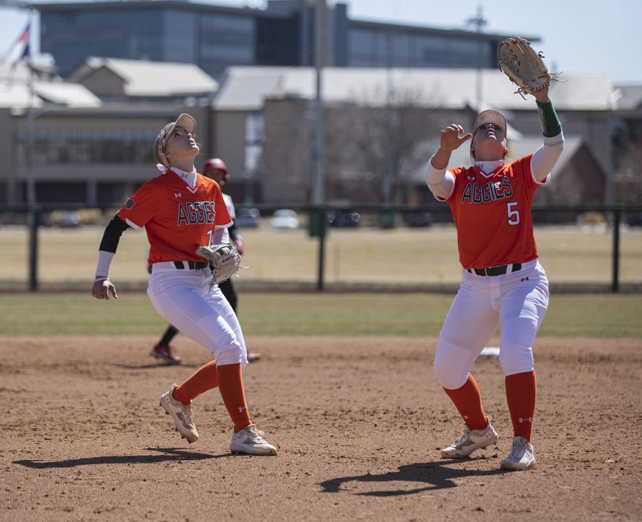 Kaitlyn Cook (16) and Sydney Hornbuckle (5) watch for a hit ball at Ram Field March 19, 2023. The Rams beat San Diego State University 3-2, rounding out their series against the Aztecs 2-1.