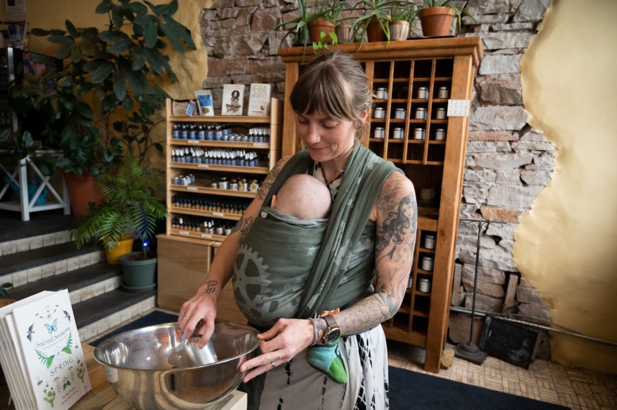 Genevieve Smith, certified herbalist and a kitchen production worker, at Golden Poppy in Fort Collins, mixes together an Immune Chai Tea blend Mar 20. “I love having the ability to to take my health into my own hands,” Smith said, when asked why she enjoys being an herbalist, “as well as having these tools accessible to help my family and friends.” Smith also recounts that part of what she loves about herbalism and holistic medicine is that it is not a ‘one-size-fits-all’ mentality. 