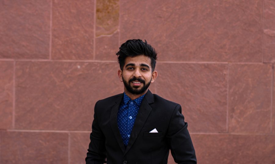 Associated Students of Colorado State University Presidential candidate Rithik Correa makes preparations outside the Lory Student Center. "Let's stop looking at ASCSU as a student organization" Correa said. "Let's start looking at it as a student union." The upcoming election takes place from April 3rd to 5th. March 23.