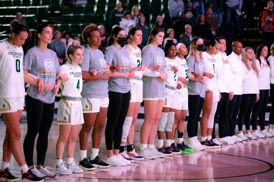 The Colorado State University womens basketball team stands for the national anthem before their game against the United States Air Force Academy at Moby Arena Feb. 18, 2023.