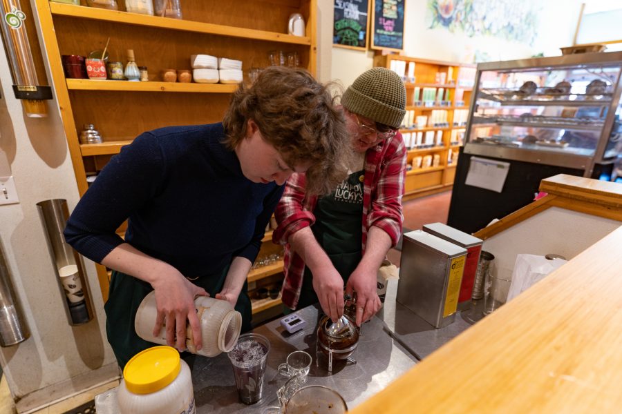 Happy Luckys Teahouse leafsters Diane McGovern and Axel Stokes prepare tea together March 26. We have a little bit of everything, says McGovern. Everything from herbal and rooibos to green tea, black tea, oolong, white tea, even one yellow tea.