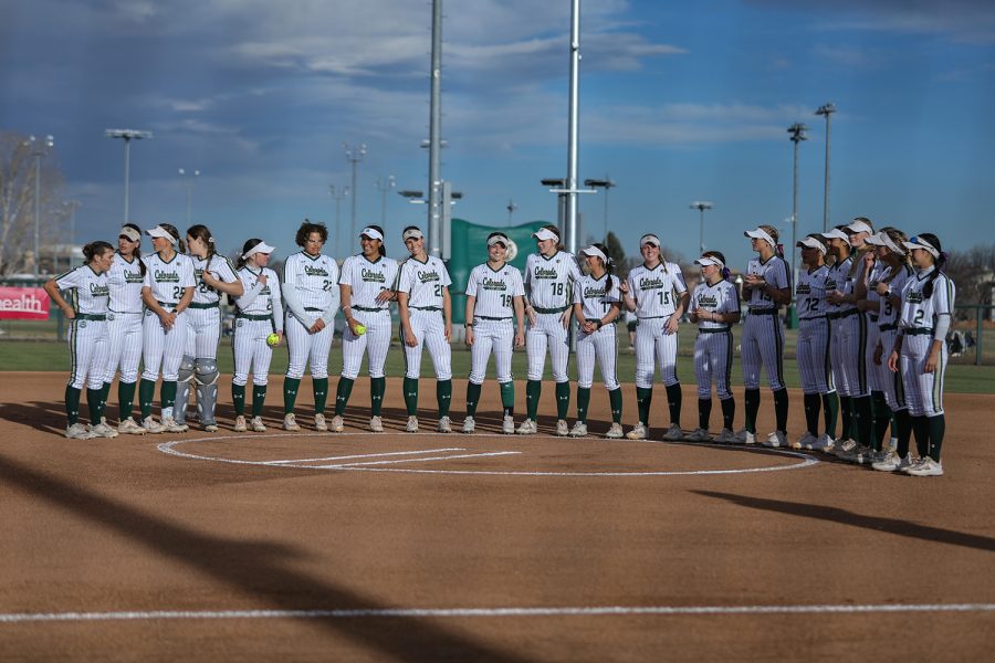 The Colorado State University softball team gathers around the pitching circle at Ram Field before the teams first-ever night game April 1. CSU celebrated the grand opening of Ram Field Saturday after a renovation supported by the Bohemian Foundations $5 million donation to the university in 2022.