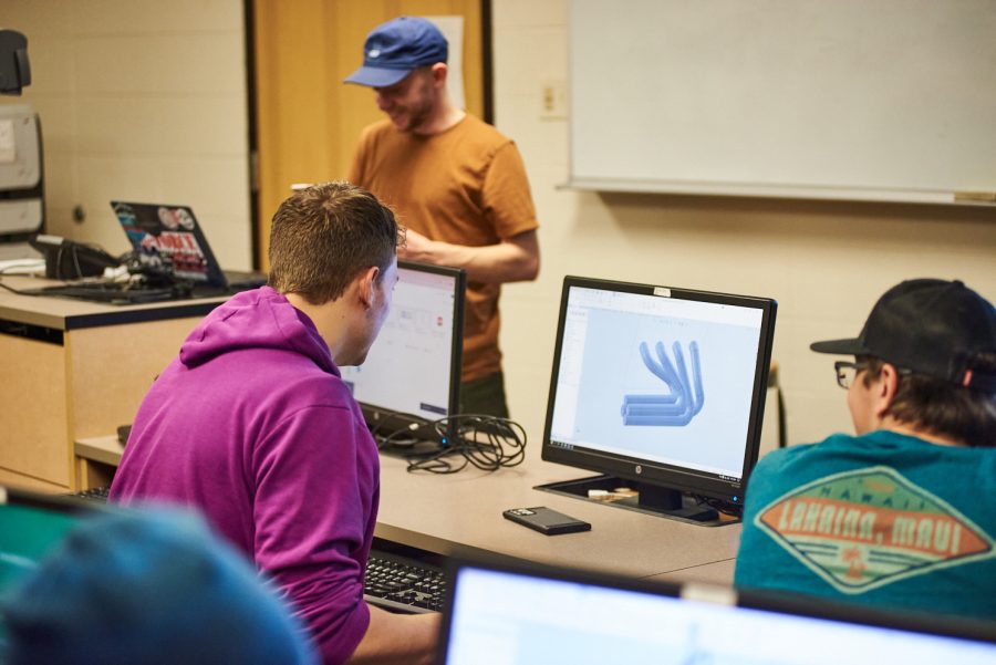 Ryan Klotz, senior mechanical engineering student, designs the exhaust manifold of the Ram Racing vehicle Oct. 26, 2022. Fall semester consisted of vehicle design and optimization, while spring semester consisted of manufacturing and testing.