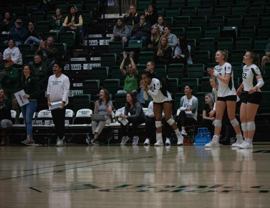 The bench cheering on their team to get the energy up in the Moby Stadium on April 8.