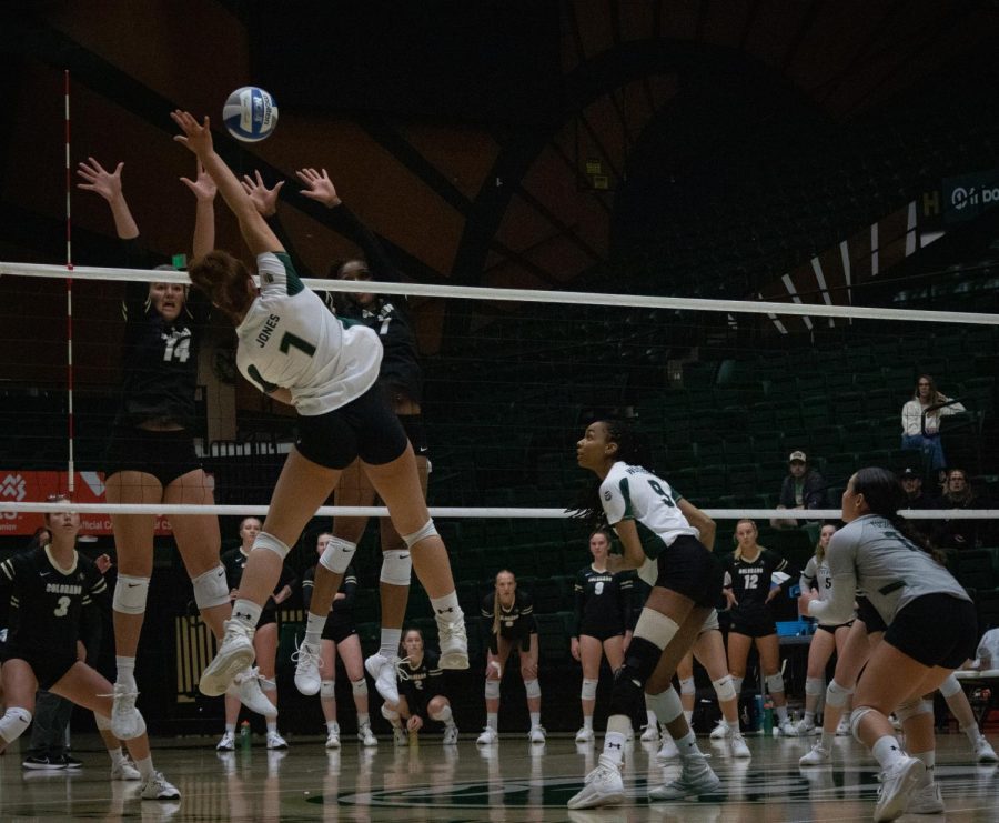 Malaya Jones, 1, spiking the ball down to earn the winning point against CU Boulder.