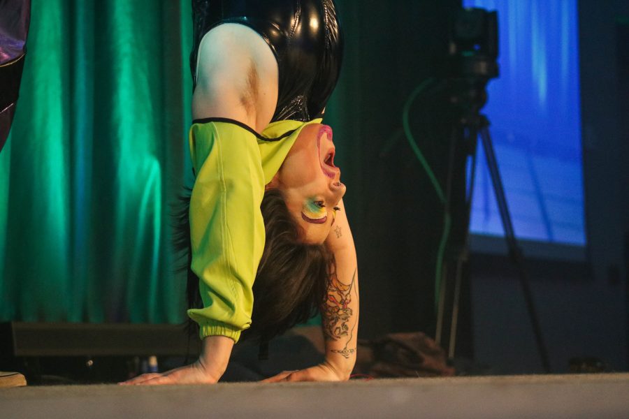Reggie Fava performs to Dragostea Din Tei by O-Zone while doing a handstand at the Colorado State University Drag Show April 9.