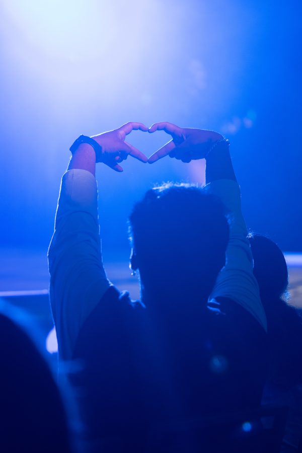 An audience member shows love to Alanna Filipina during her performance at the Colorado State University Drag Show in the Lory Student Center Grand Ballroom April 9.