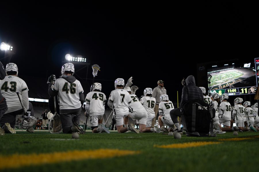 The+Colorado+State+University+mens+lacrosse+team+take+a+knee+during+an+injury+in+the+game+against+University+of+Colorado+Boulder+April+15.