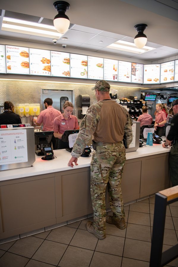 Sgt. Gar Haugo orders at Chick-fil-A after participating in a Fort Collins Police Services Special Weapons and Tactics team practice Sept. 27, 2022.
