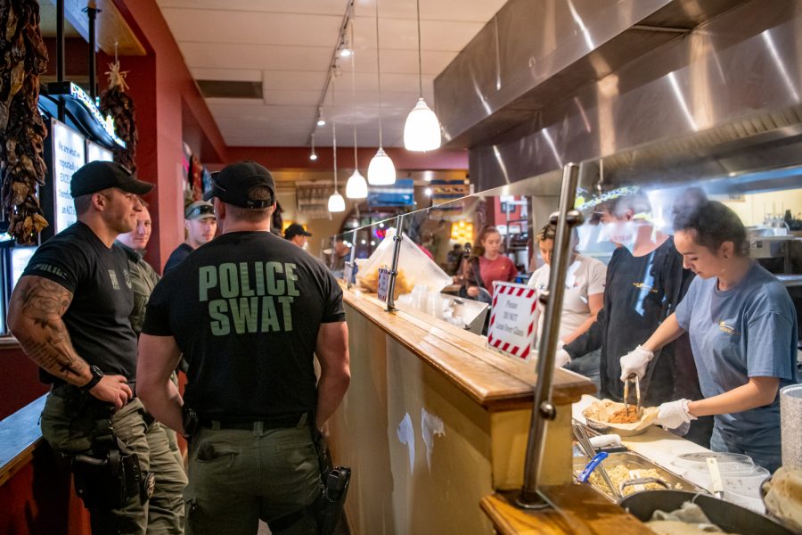Members of the Fort Collins Police Services Special Weapons and Tactics team finish training by getting dinner at Cafe Mexicali Oct. 19, 2022. The team often gets food together after training.