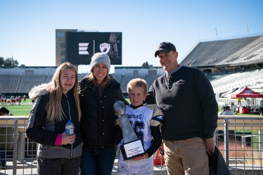 Sgt. Gar Haugo attends his son Colt Haugos championship football game at the Colorado State University Canvas Stadium with his wife Amanda Haugo and daughter Tatum Oct. 29. As the only full-time Fort Collins Police Services SWAT team member, Gar Haugo is constantly on call and can be called away at any moment. “You have to learn how to live like that,” Haugo said. “Now, that has a drawback on your family. It has a drawback on you kind of personally because I think you feel like you’re (in) a state of awareness all the time. And some people I think maybe would have more (problems) with that than others and some have just kind of gotten used to that. But you always have to be thinking a little bit about, ‘What am I doing if this happens? Who do I get a call or drop off? Or where are the kids going? What other stuff do I got going on?’”