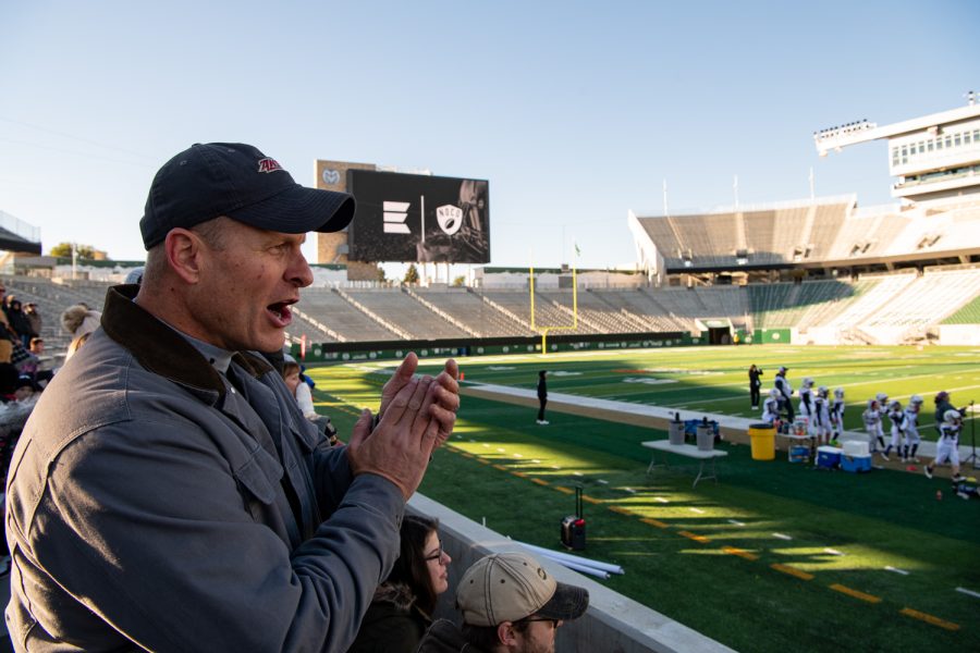 Sgt. Gar Haugo attends his son Colt Haugos championship football game at the Colorado State University Canvas Stadium with his wife Amanda Haugo and daughter Tatum Haugo Oct. 29, 2022. As the only full-time Fort Collins Police Services SWAT team member, Gar Haugo is constantly on call and can be called away at any moment. “You have to learn how to live like that,” Haugo said. “Now, that has a drawback on your family. It has a drawback on you kind of personally because I think you feel like you’re (in) a state of awareness all the time. And some people I think maybe would have more (problems) with that than others and some have just kind of gotten used to that. But you always have to be thinking a little bit about, ‘What am I doing if this happens? Who do I get a call or drop off? Or where are the kids going? What other stuff do I got going on?’”