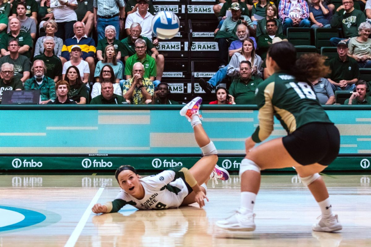 Colorado State University Defensive Specialist Ruby Kayser (49) dives to save the ball during the volleyball game against Stanford University Aug. 26. Stanford won 3-1.