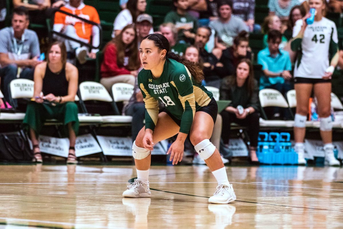 Colorado State University Defensive Specialist Kate Yoshimoto (18) waits for the serve during the volleyball game against Stanford University Aug. 26.