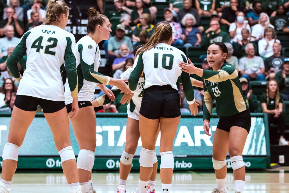 The Colorado State University volleyball team huddles during the volleyball game against Stanford University Aug. 26. Stanford won 3-1.