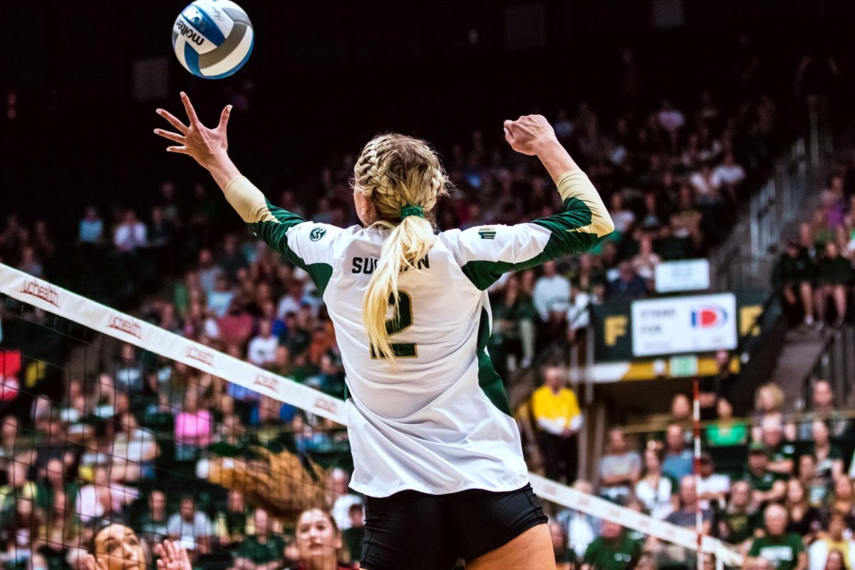 Colorado State University Outside Hitter Annie Sullivan (2) spikes the ball during the volleyball game against Stanford University Aug. 26.