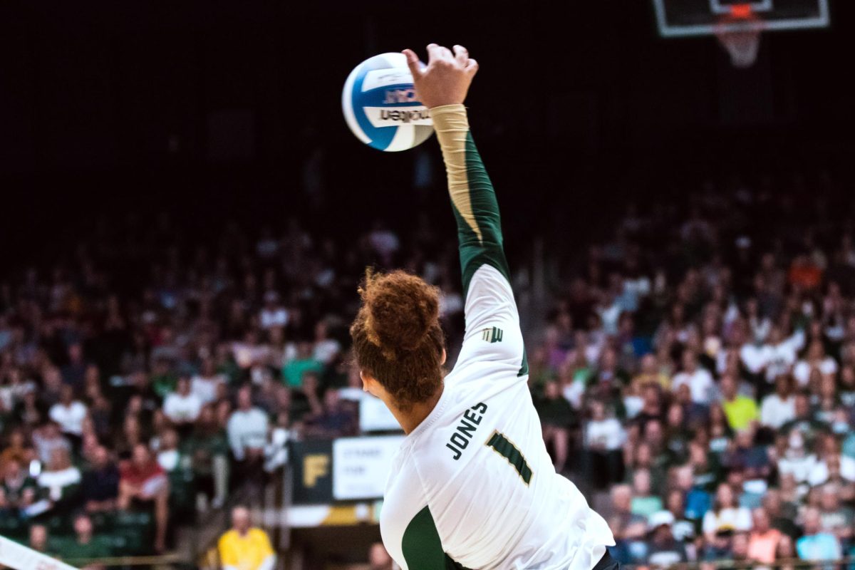 Colorado State University Middle Blocker Malaya Jones (1) spikes the ball during the volleyball game against Stanford University Aug. 26.