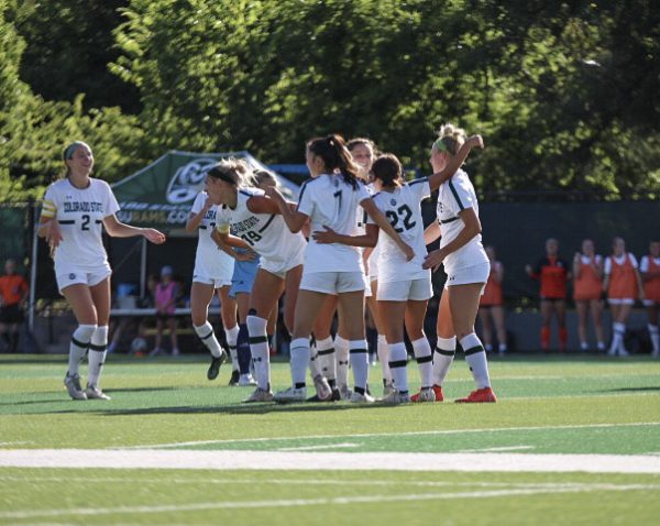 The Colorado State University Womens Soccer team celebrates a goal scored by Mia Casey (22) on August 31. 