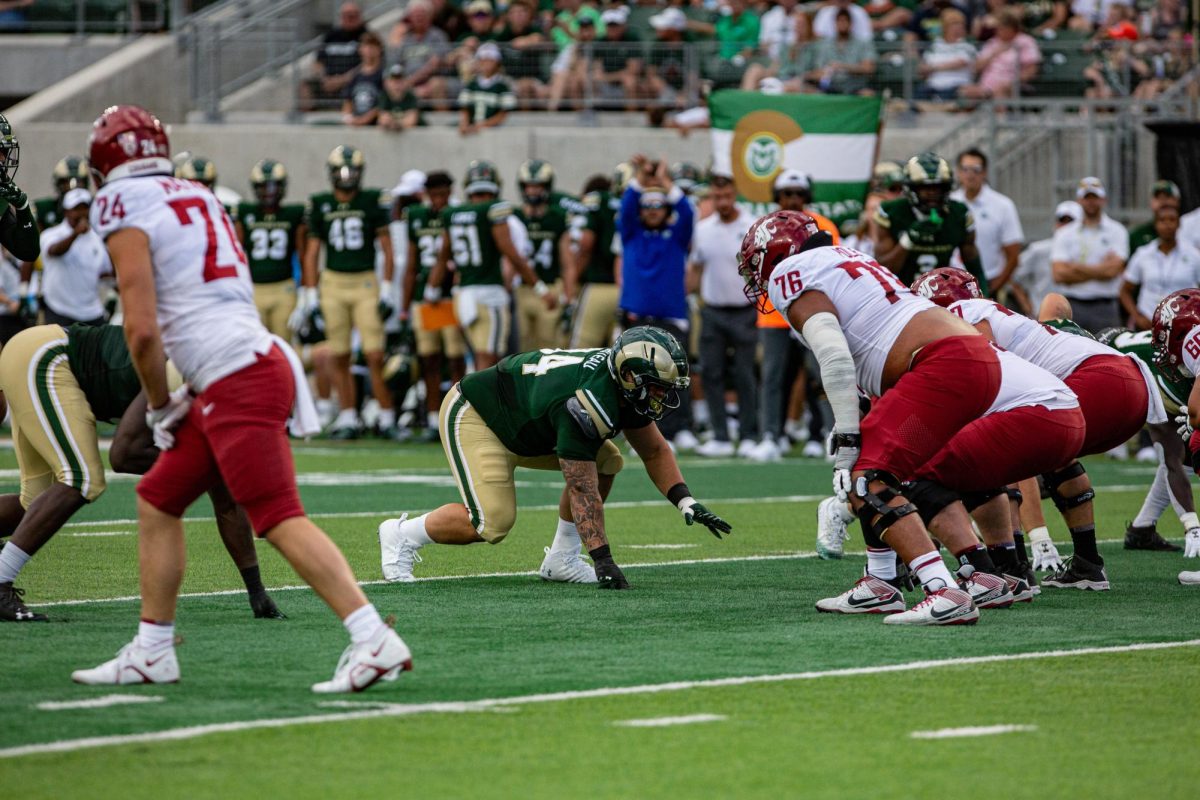 Colorado State University defensive lineman Cam Bariteau prepares to make a stop vs the Washington State University Cougars during the Rams loss at Canvas Stadium Sep. 2. CSU lost 24-50. Photo by River Kinnaird.