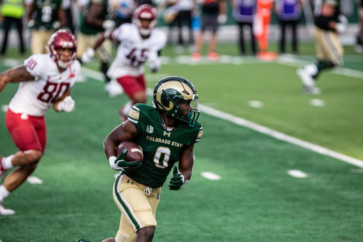 Colorado State University running back Kobe Johnson (0) put on a show for the crowd at Canvas Stadium during CSU's loss to the Washington State University Cougars Sep. 2. CSU lost 24-50. Photo by River Kinnaird.