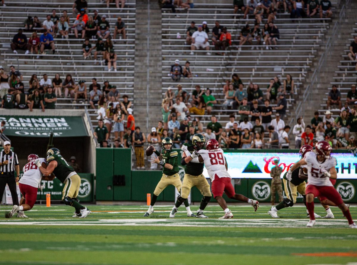 Colorado State University quarter back Clay Millen (11) made tough passes but it was not enough as CSU lost to Washington State University 24-50 during the season opener at Canvas Stadium Sep. 2. Photo by River Kinnaird.