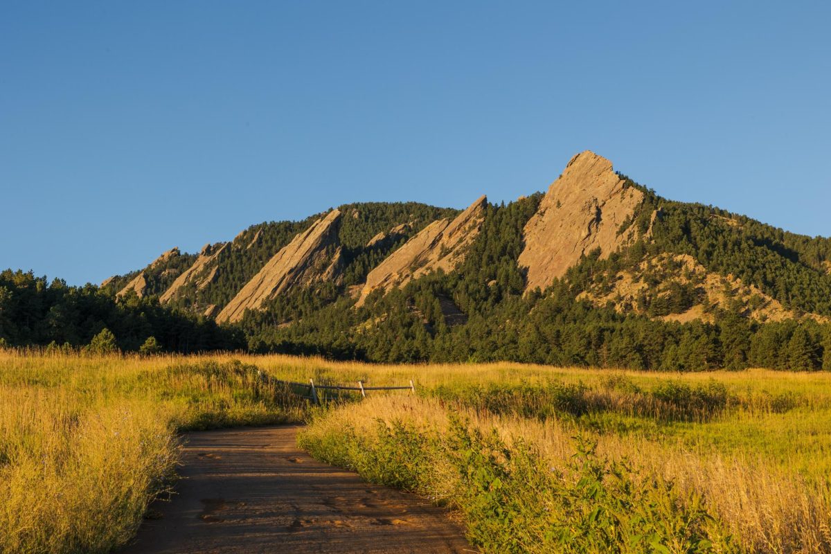 Sunrise reflecting from the Flatirons in Boulder, Colorado.