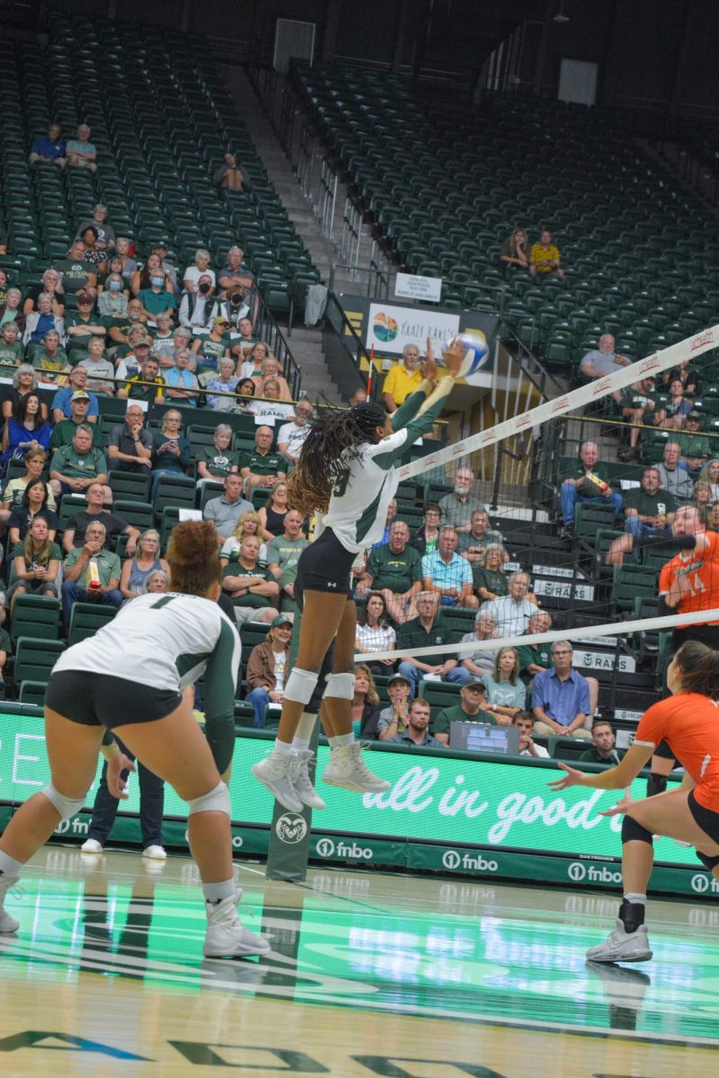 Naeemah Weather (9) blocks a hit from Bowling Green State University.