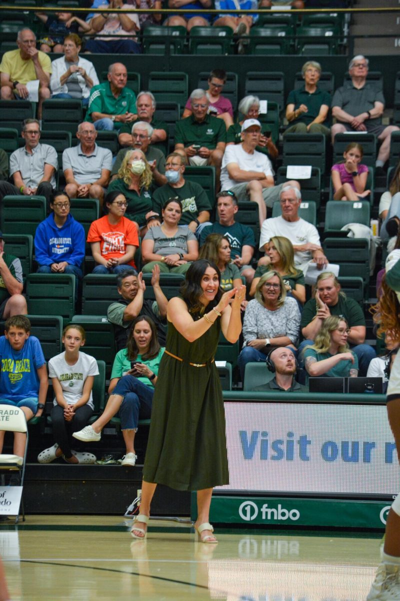 Colorado State University volleyball coach Emily Kohan cheers on the Rams Sep. 7. Kohan is in her first year as head coach after Tom Hilberts retirement last year.